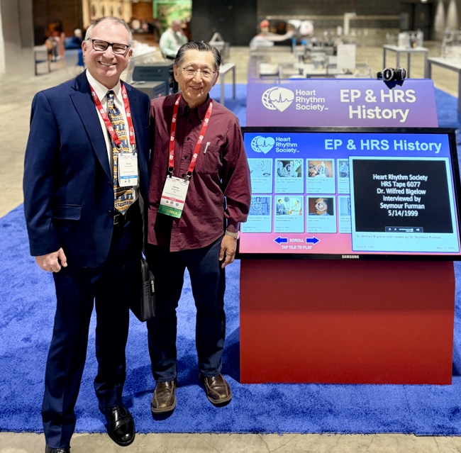 David Prutchi PhD with James Ong MD at HRS 2026' historical device display